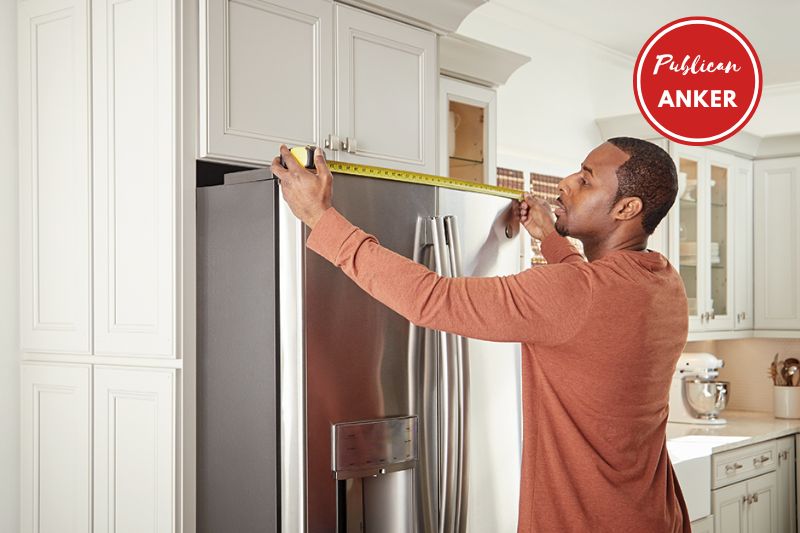 Measure fridge and doorways then create a moving dolly plan.